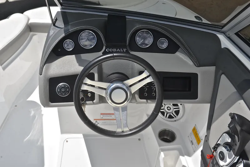 Slide: The Image of Steering wheel and dashboard of 2011 Cobalt 200 boat. - 25