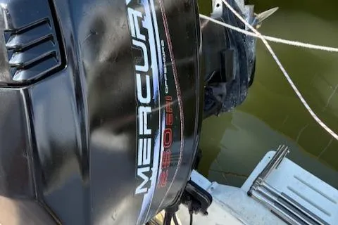 Slide: The Image of Mercury 150 EFI outboard motor on 1995 Wellcraft 23 Excel boat. - 22