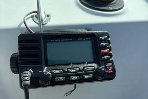 Slide: The Image of Marine radio on a 1995 Wellcraft 23 Excel boat dashboard. - 6