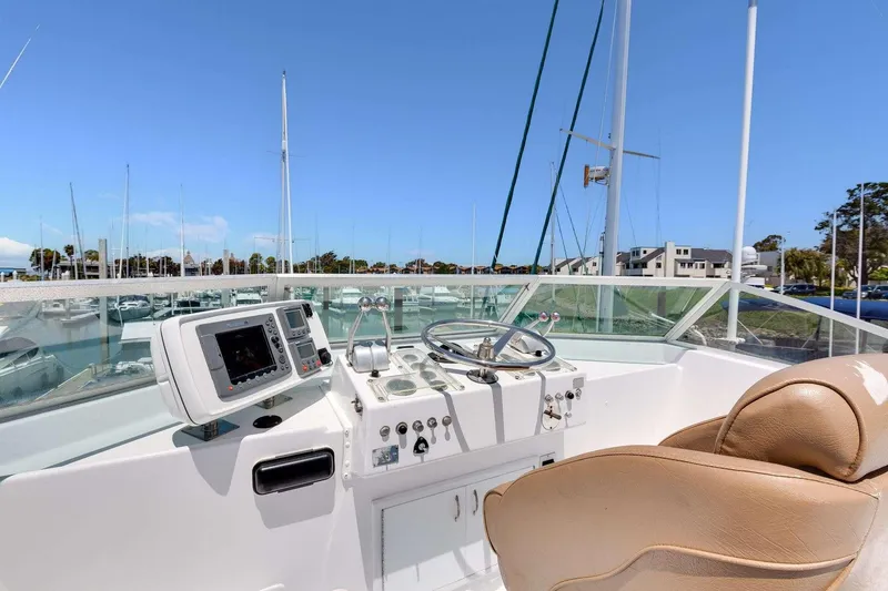 Slide: The Image of 1973 Hatteras 58 Tricabin flushdeck MY helm with navigation equipment and leather seat. - 43