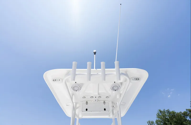 Slide: The Image of 2025 Sea Hunt Ultra 219 boat top view against clear blue sky. - 12