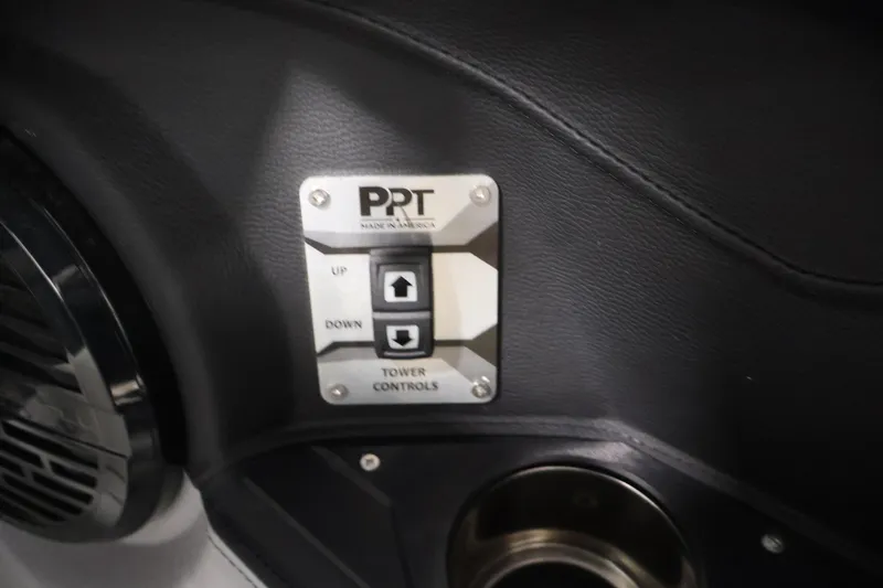 Slide: The Image of 2026 Centurion Ri245 tower controls with up and down buttons, black interior. - 20