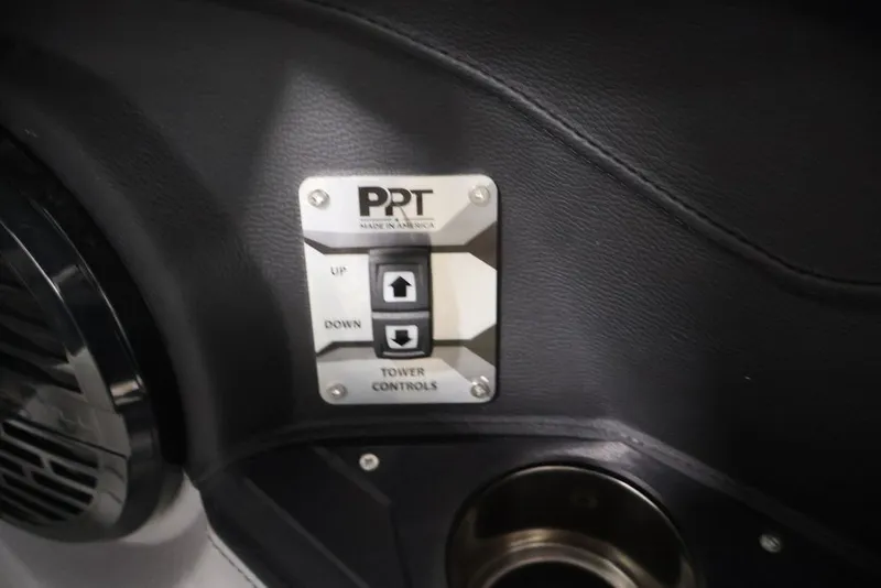Slide: The Image of 2026 Centurion Ri245 tower controls with up and down buttons on black panel. - 14