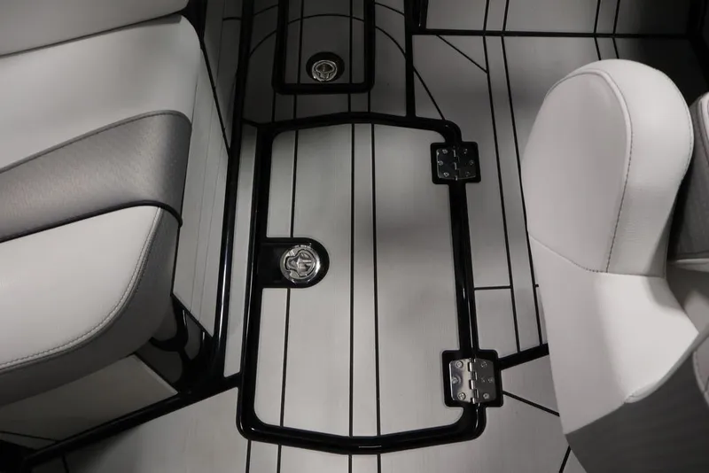 Slide: The Image of Interior of 2026 Centurion Ri245 boat with sleek seating and modern flooring design. - 31