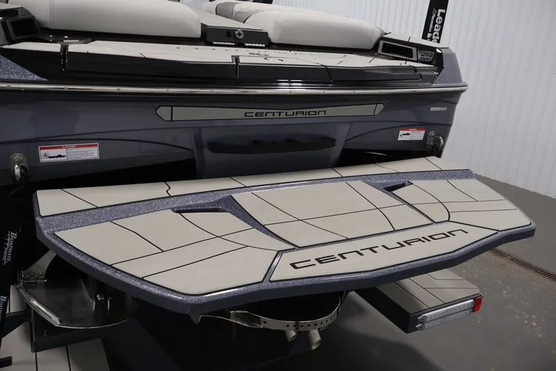 Slide: The Image of 2026 Centurion Ri245 boat rear view with branded swim platform. - 45