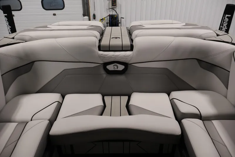 Slide: The Image of 2026 Centurion Ri245 boat interior with luxurious seating and modern design. - 37