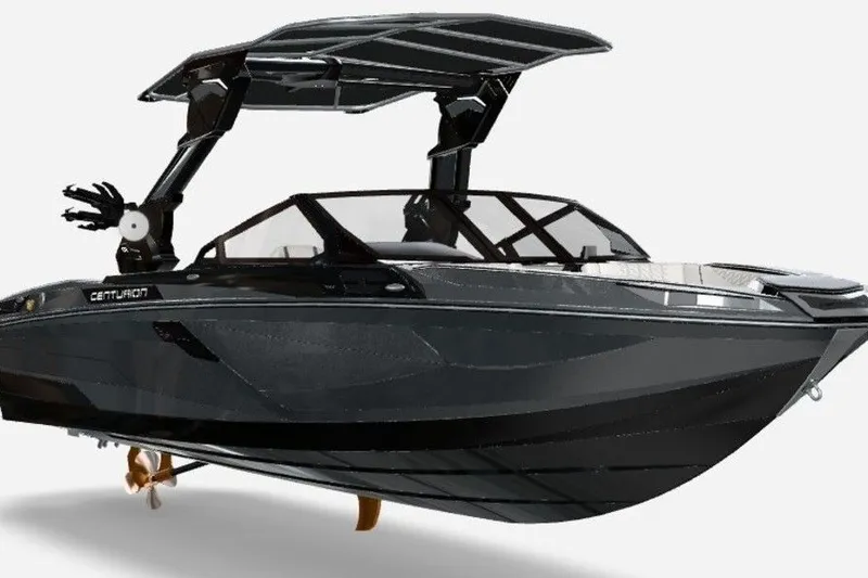 Slide: The Image of 2026 Centurion Ri245 boat with sleek black design and modern features. - 74