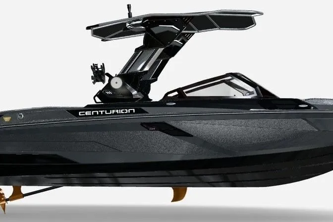 Slide: The Image of 2026 Centurion Ri245 boat, sleek black design, advanced wakeboard tower, side view. - 67