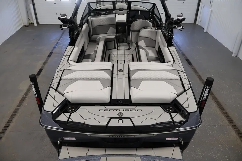 Slide: The Image of 2026 Centurion Ri245 boat interior with modern seating and sleek design. - 9