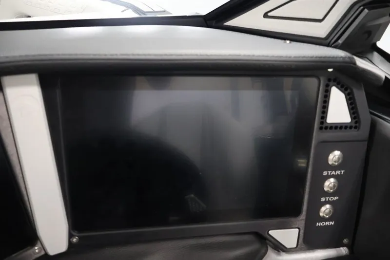 Slide: The Image of 2026 Centurion Ri245 dashboard with touchscreen and control buttons for start, stop, and horn. - 33