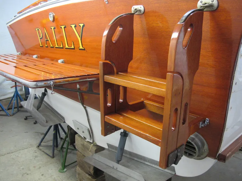 Slide: The Image of 1991 Windsor Craft 310 boat with wooden swim platform and ladder, named "Pally." - 3
