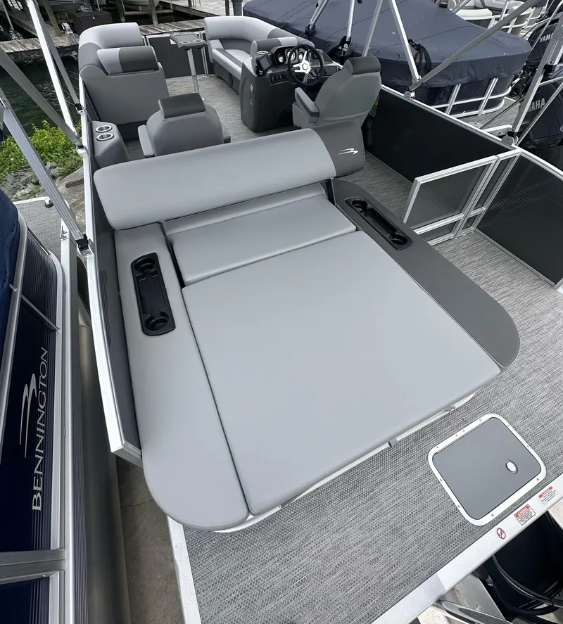 Slide: The Image of 2024 Bennington SV 22 Swingback pontoon boat with spacious seating and modern design. - 5