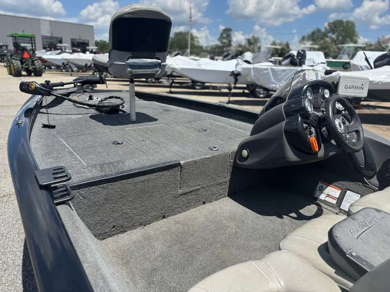 Slide: The Image of 2018 Tracker Pro Team™ 175 TXW fishing boat interior with steering console and seating. - 11