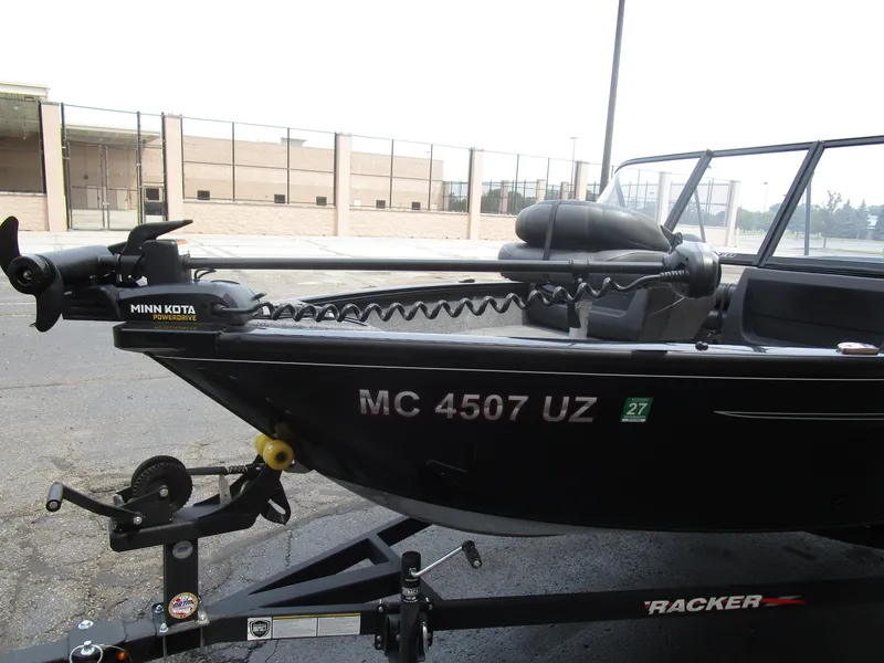 Slide: The Image of 2024 Tracker Pro Guide V16 WT boat with Minn Kota PowerDrive motor on trailer. - 4