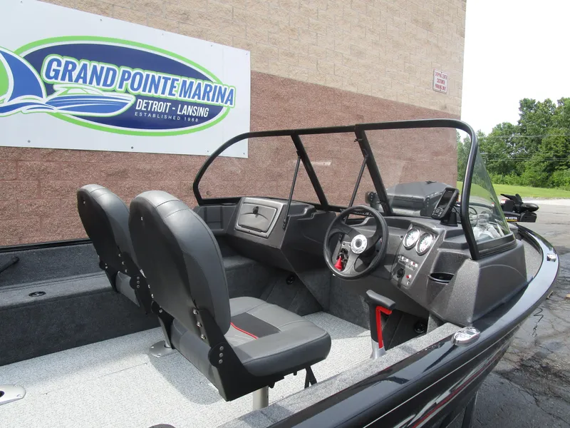 Slide: The Image of 2024 Tracker Pro Guide V16 WT boat interior at Grand Pointe Marina. - 7