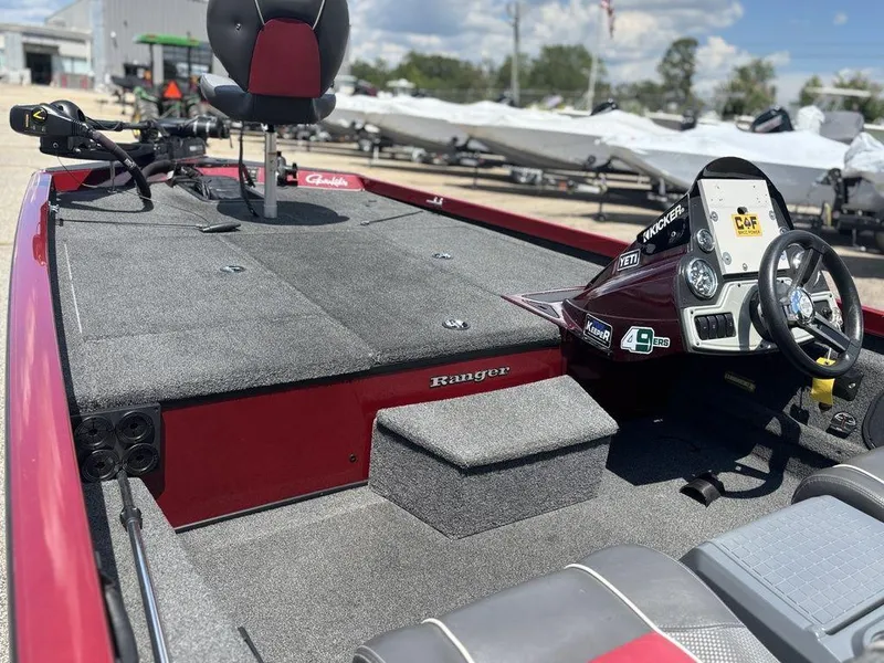 Slide: The Image of 2017 Ranger RT188 boat interior with steering wheel, seat, and control panel. - 10