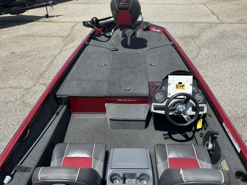 Slide: The Image of 2017 Ranger RT188 boat interior with steering wheel, seats, and control panel. - 15