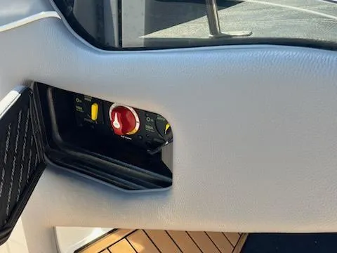 Slide: The Image of 2019 Correct Craft Nautique G 25 Super Air boat interior control panel. - 20