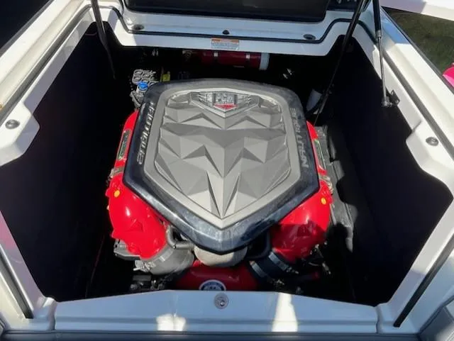 Slide: The Image of 2019 Correct Craft Nautique G 25 Super Air engine compartment with powerful inboard motor. - 28