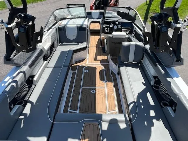 Slide: The Image of 2019 Correct Craft Nautique G 25 Super Air interior with sleek seating and modern design. - 9