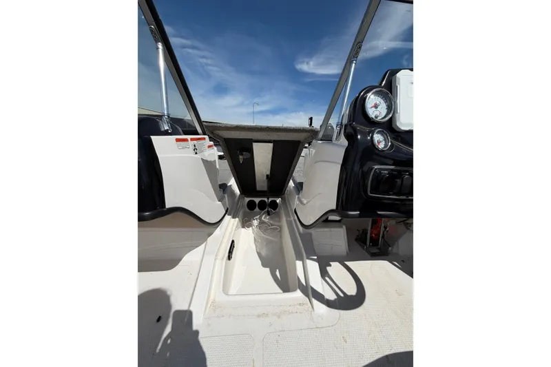 Slide: The Image of 2018 Nitro Z19 Sport boat interior with dashboard and steering wheel. - 8
