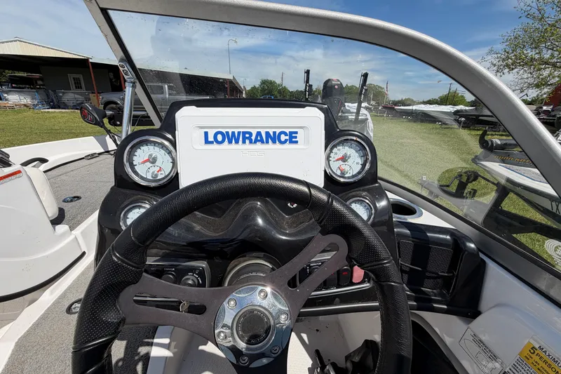 Slide: The Image of Steering console of 2018 Nitro Z19 Sport boat with Lowrance display and gauges. - 9