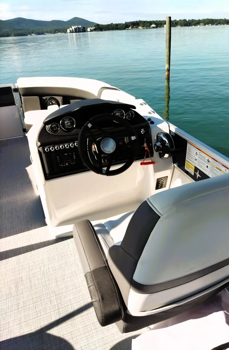 Slide: The Image of 2024 Berkshire 22RFX CTS 3.0 Performance boat interior with steering wheel and dashboard. - 4