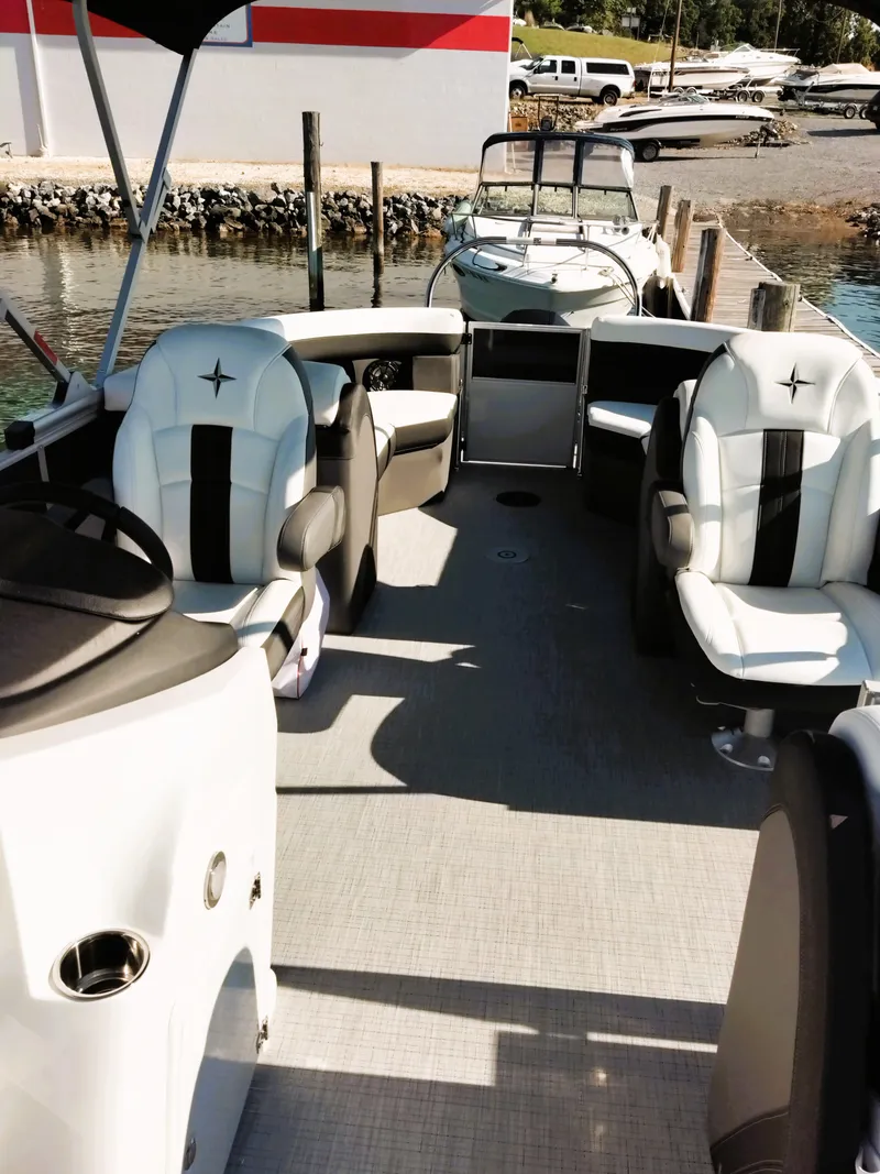 Slide: The Image of 2024 Berkshire 22RFX CTS 3.0 Performance boat interior with plush seating and modern design. - 6