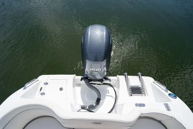 Slide: The Image of 2024 Sea Hunt Ultra 234 boat with 200 HP outboard motor. - 19