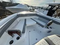 Slide: The Image of 2024 Everglades 315 Center Console boat interior with seating and modern design. - 10