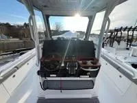 Slide: The Image of 2024 Everglades 315 Center Console boat interior with helm and seating. - 7