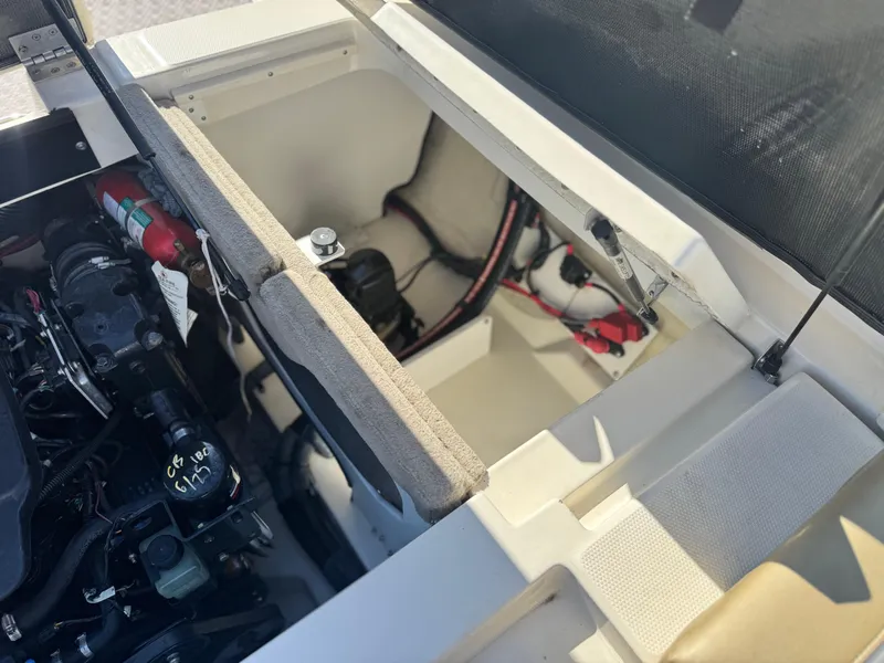 Slide: The Image of 2007 Sea Ray 210 Select engine compartment with visible components and wiring. - 22