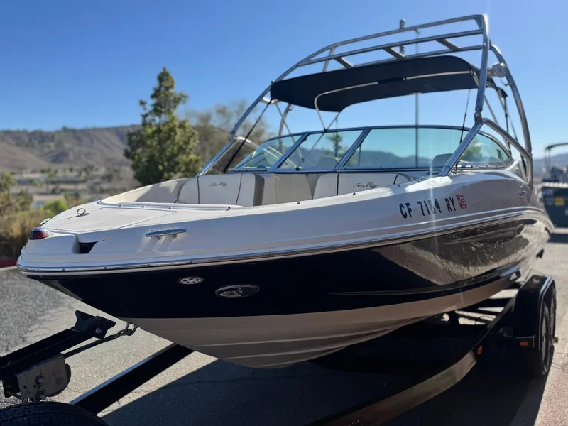 Slide: The Image of 2007 Sea Ray 210 Select boat on trailer, sunny day, outdoor setting. - 3