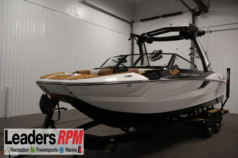 The Image of 2026 Centurion Fe22 boat in showroom, displayed by Leaders RPM, featuring sleek design. - 0