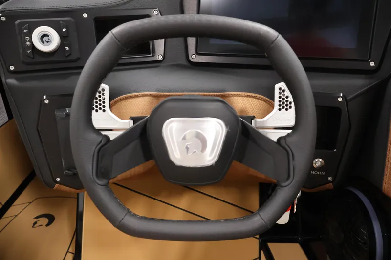 Slide: The Image of Steering wheel of 2026 Centurion Fe22 boat with modern dashboard controls. - 14