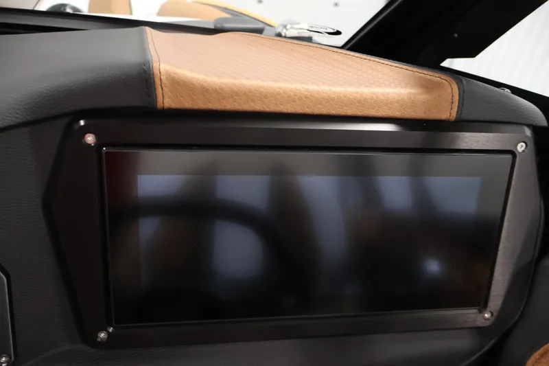Slide: The Image of 2026 Centurion Fe22 dashboard with touchscreen display and tan leather accents. - 16
