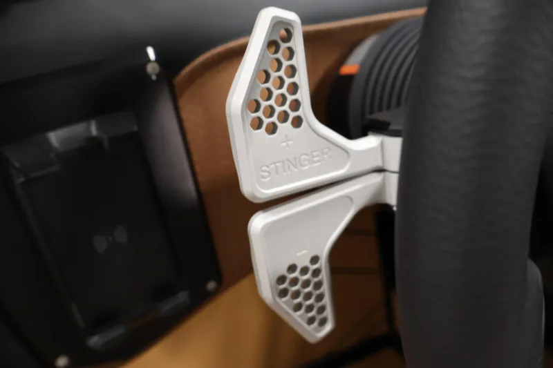 Slide: The Image of Close-up of Centurion Fe22 2026 steering wheel with Stinger paddle shifters. - 20