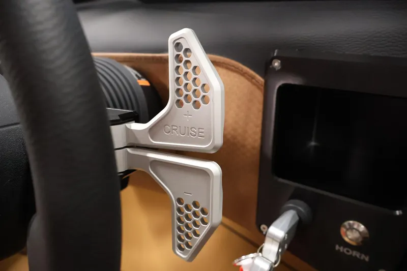 Slide: The Image of Steering wheel with cruise control paddles in 2026 Centurion Fe22 vehicle. - 21