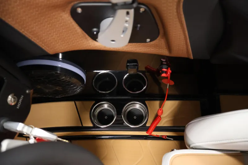 Slide: The Image of Interior of 2026 Centurion Fe22 featuring cup holders and modern design elements. - 22