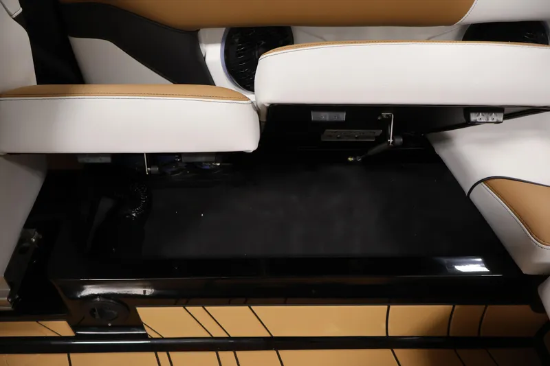 Slide: The Image of 2026 Centurion Fe22 boat interior seating with white and tan upholstery. - 33