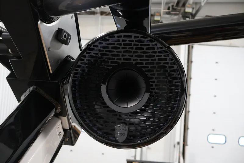 Slide: The Image of Close-up of a Centurion Fe22 2026 boat speaker system in a garage setting. - 34