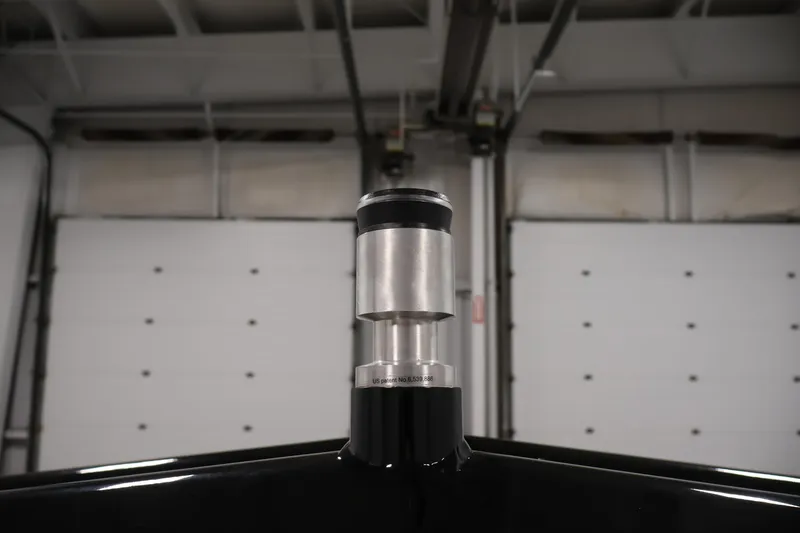 Slide: The Image of 2026 Centurion Fe22 boat component in a garage setting. - 35
