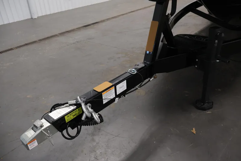 Slide: The Image of Trailer hitch of a 2026 Centurion Fe22 boat, displayed indoors on concrete floor. - 45