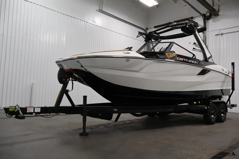 Slide: The Image of 2026 Centurion Fe22 boat on trailer in indoor storage facility. - 47