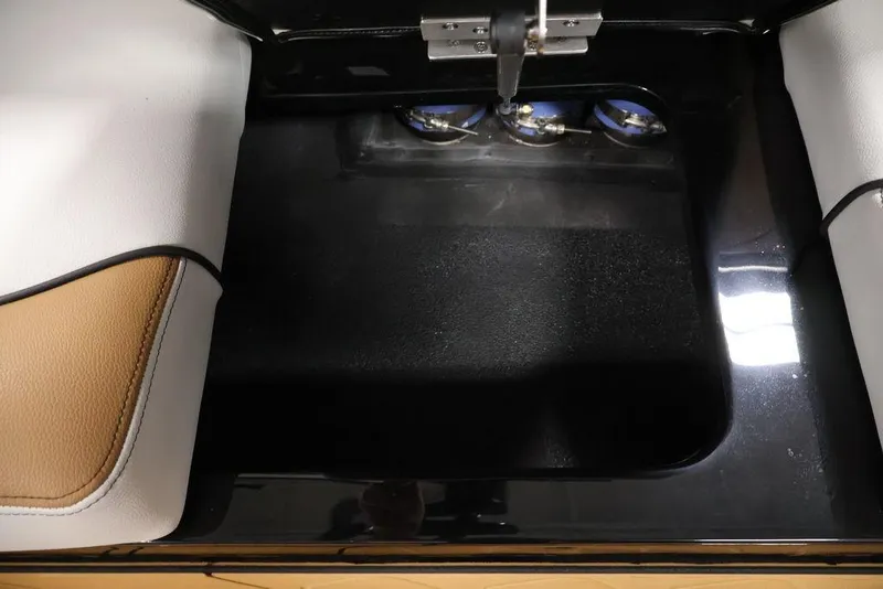 Slide: The Image of Interior view of 2026 Centurion Fe22 boat storage compartment with sleek design. - 52