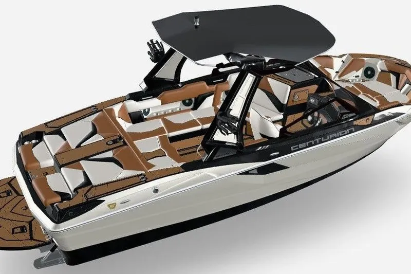 Slide: The Image of 2026 Centurion Fe22 boat with sleek design, brown and white interior, and black canopy. - 9