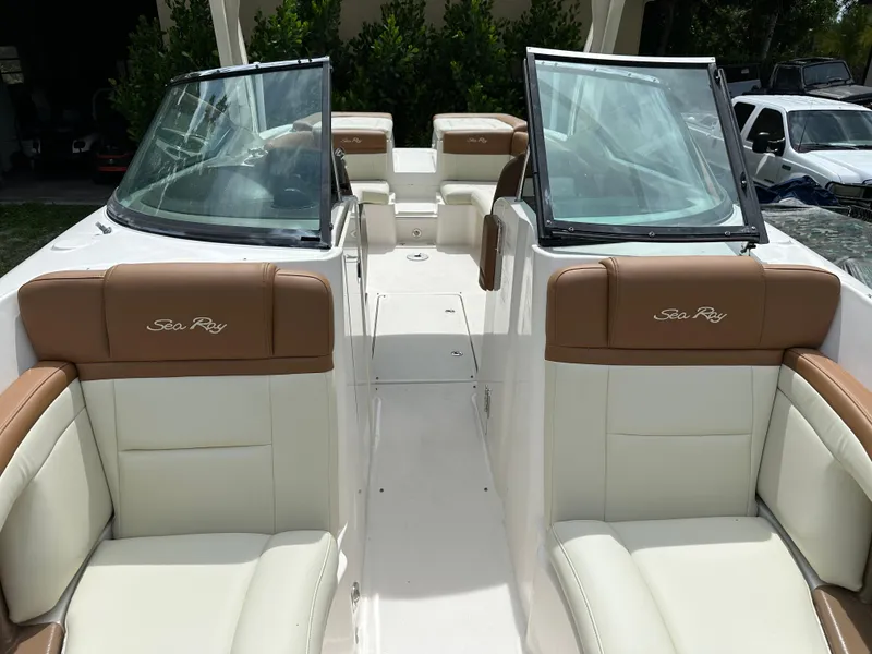 Slide: The Image of 2012 Sea Ray SLX 270 boat interior with tan and white seating. - 5
