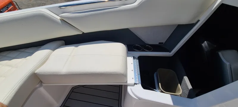 Slide: The Image of 2020 Cobalt R5 boat interior with white seating and cup holders. - 18