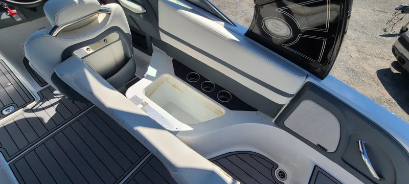 Slide: The Image of 2020 Cobalt R5 boat interior with seating and storage compartments. - 33