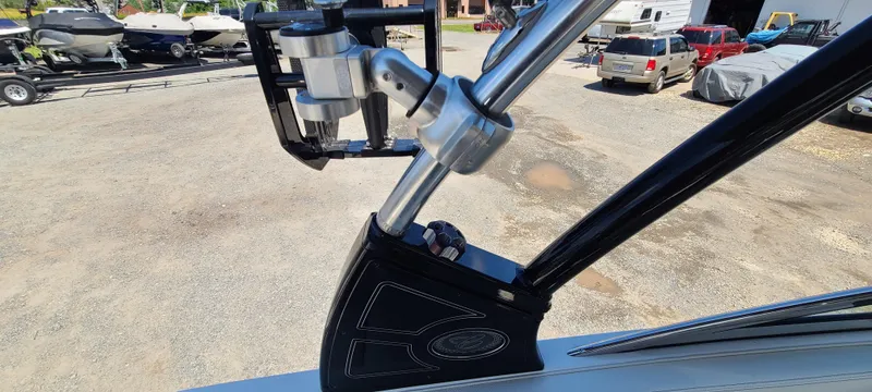 Slide: The Image of Close-up of a 2020 Cobalt R5 boat's wakeboard tower in a marina setting. - 34